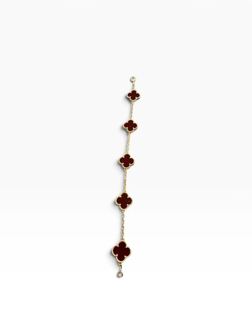 Van Cleef & Arpels Gold Bracelet with Deep Red Alhambra Motifs